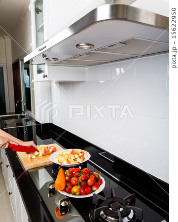 Cooking vegetables and fruit salad in kitchen 15622950