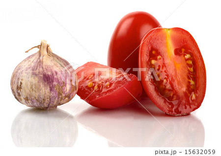 Fresh Roma tomatoes with a garlic bulb Fresh Roma tomatoes with a garlic bulb 15632059