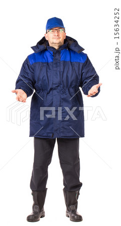 Worker in blue workwear. Worker in blue workwear. 15634252