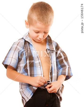 little boy buttoning on shirt, isolated on white 15646174