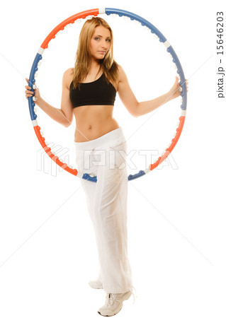 sporty fit girl doing exercise with hula hoop. sporty fit girl doing exercise with hula hoop. 15646203