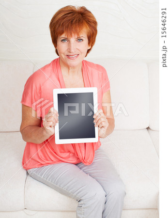 Mature woman with tablet pc 15646291