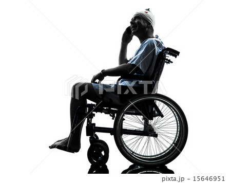 injured man on the telephone happy  in wheelchair silhouette 15646951