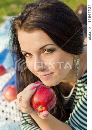 beautiful and sexy girl sitting on bench outdoors beautiful and sexy girl sitting on bench outdoors 15647584