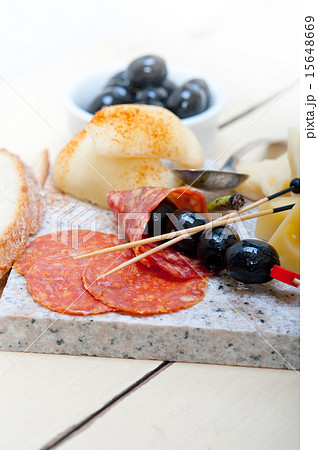 mix cold cut on a stone with fresh pears mix cold cut on a stone with fresh pears 15648669