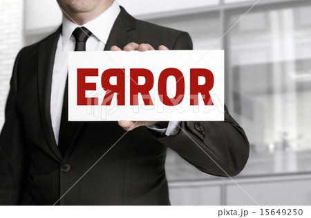 Error sign held by businessman Error sign held by businessman 15649250