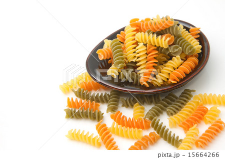 Pile of Pasta fusilli in black bowl Pile of Pasta fusilli in black bowl 15664266