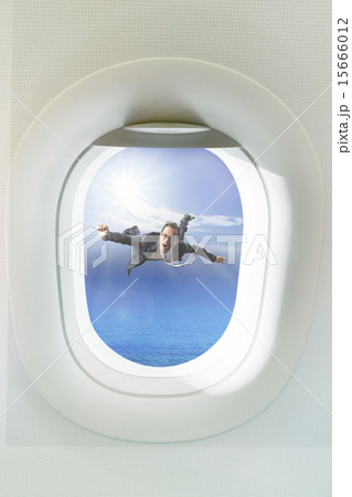 business man floating mid air out passenger plane business man floating mid air out passenger plane 15666012