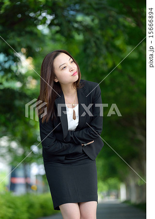 Chinese businesswoman having stomachache 15666894