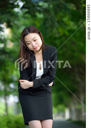 Chinese businesswoman having stomachache 15666895