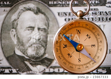 Compass Instrument in Front of a 50 US Dollar Bill Compass Instrument in Front of a 50 US Dollar Bill 15667333