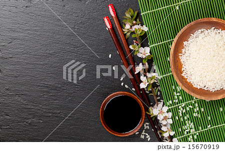 Japanese chopsticks, soy sauce, rice and sakura 15670919