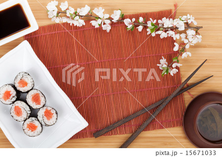 Sushi maki set, green tea and sakura branch 15671033