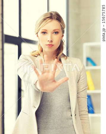 young woman making stop gesture 15675785