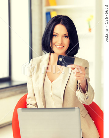 happy woman with laptop computer and credit card happy woman with laptop computer and credit card 15676653