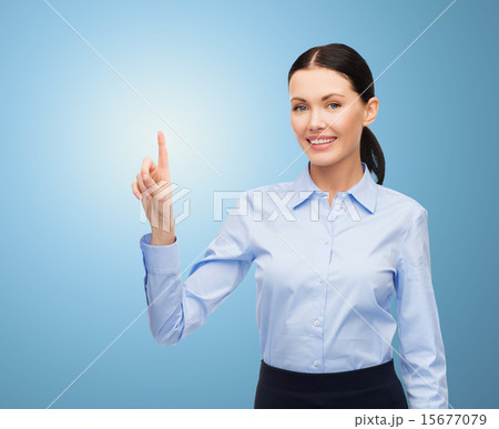 businesswoman touching something imaginary businesswoman touching something imaginary 15677079