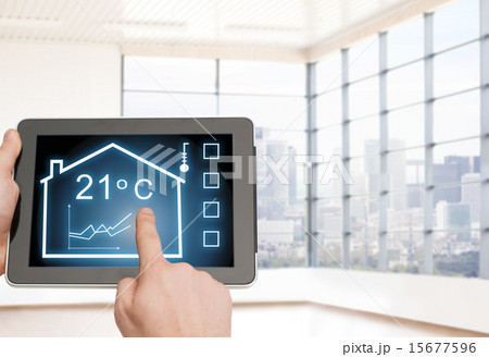 close up of man hands touching tablet pc screen 15677596