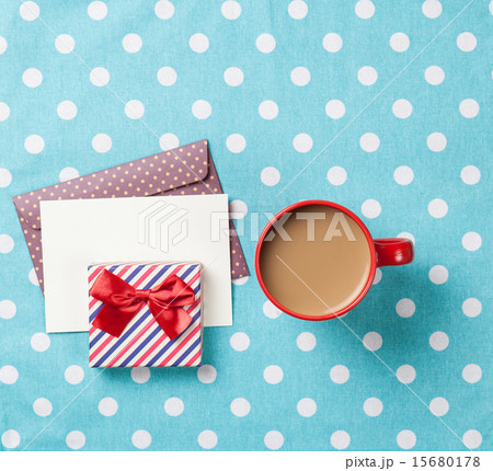 Cup of coffee and envelope 15680178