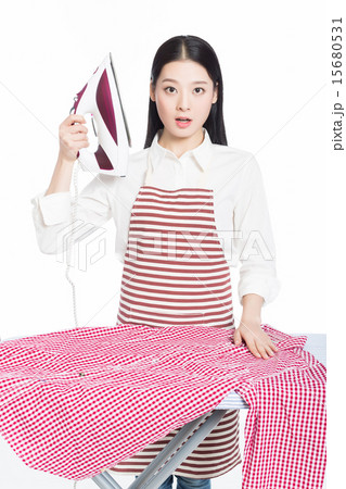 young housewife ironing 15680531
