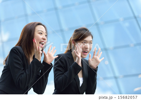 2 Chinese businesswoman shouting good luck 15682057