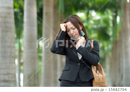 Chinese businesswoman having a headache 15682704