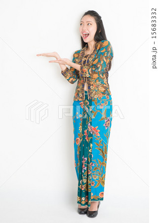 Happy girl showing something Happy girl showing something 15683332