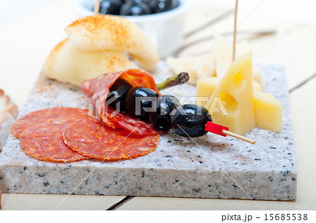 mix cold cut on a stone with fresh pears mix cold cut on a stone with fresh pears 15685538