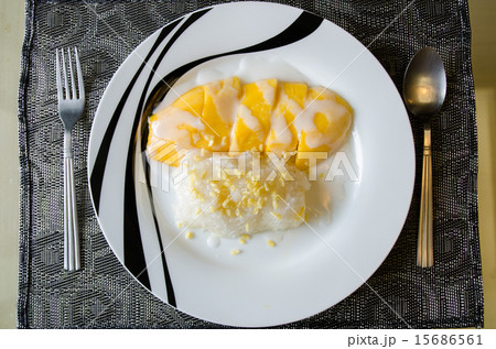 Sticky rice with mangoes with coconut milk on top Sticky rice with mangoes with coconut milk on top 15686561
