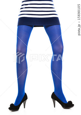 Woman long legs and blue stockings isolated Woman long legs and blue stockings isolated 15690105