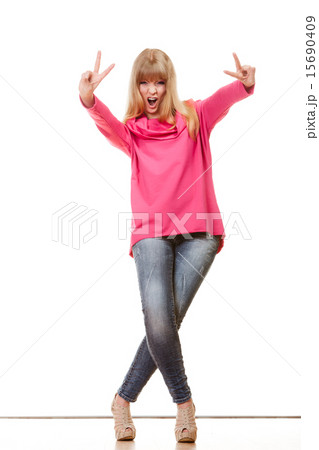 Happy woman showing victory sign 15690409