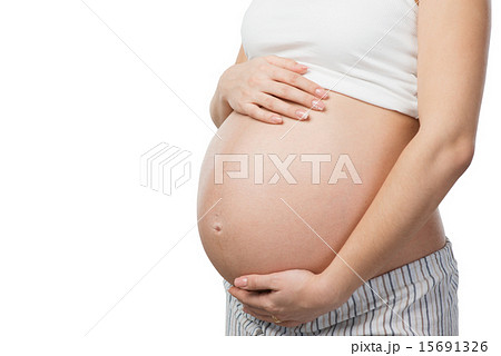 Close up photo of young pregnant woman belly 15691326