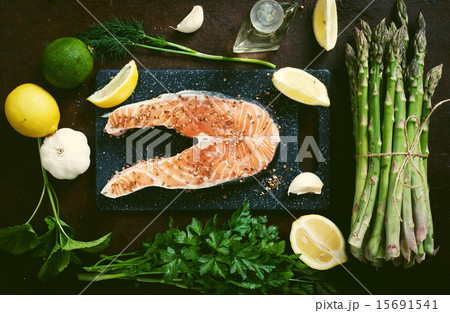 Salmon and spices on wooden table. Top view Salmon and spices on wooden table. Top view 15691541