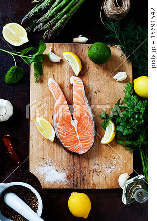 Salmon and spices on wooden table. Top view Salmon and spices on wooden table. Top view 15691542