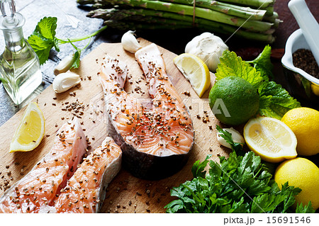 Salmon and spices on wooden table. Top view Salmon and spices on wooden table. Top view 15691546