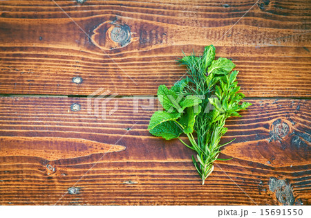 Herbs on wooden table. Seasoning concept Herbs on wooden table. Seasoning concept 15691550