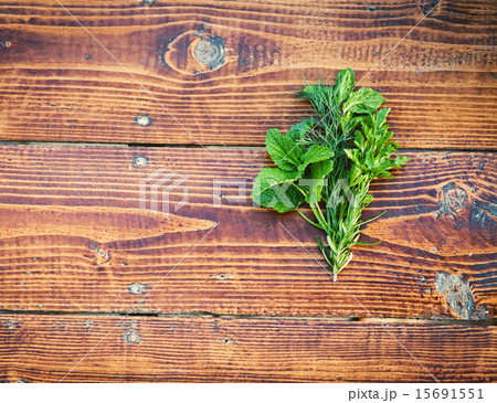 Herbs on wooden table. Seasoning concept 15691551