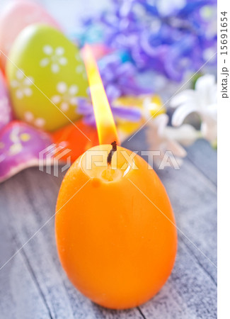 easter eggs and candle 15691654