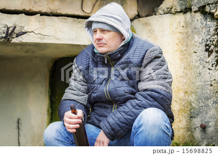 Man with beer bottle at outdoors 15698825