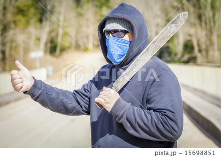 Man with machete try to stop car 15698851