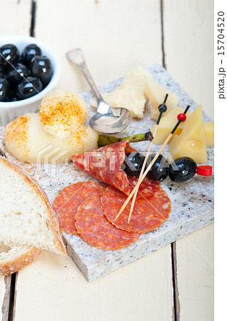 mix cold cut on a stone with fresh pears mix cold cut on a stone with fresh pears 15704520