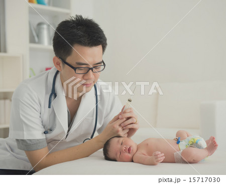 asian newborn at hospital with doctor asian newborn at hospital with doctor 15717030
