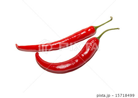 Two red hot chili peppers isolated on white. Two red hot chili peppers isolated on white. 15718499