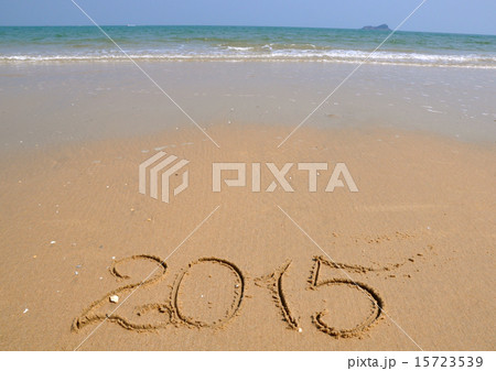 Numbers 2015 on beach - concept holiday background 15723539