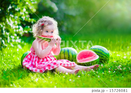 Little girl eating watermelon 15726081