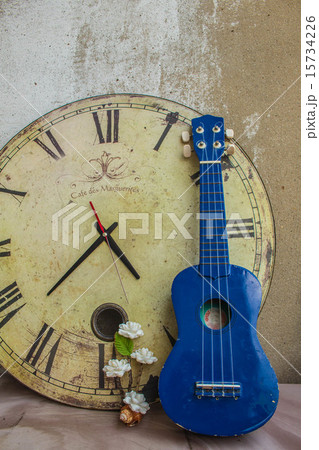Ukulele and classical clock Ukulele and classical clock 15734226