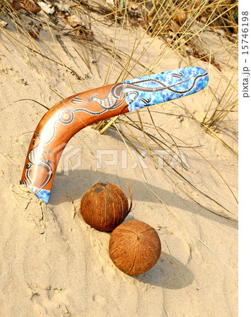 Colorful boomerang and two coconuts. 15746198