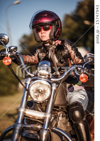Biker girl on a motorcycle 15747943
