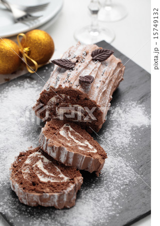 Yule log cake on a Christmas table 15749132