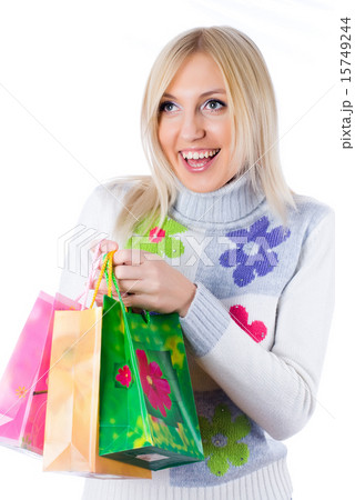 Pretty smiling girl with shopping bags Pretty smiling girl with shopping bags 15749244