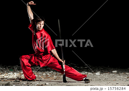 Wushoo man in red practice martial art Wushoo man in red practice martial art 15756284